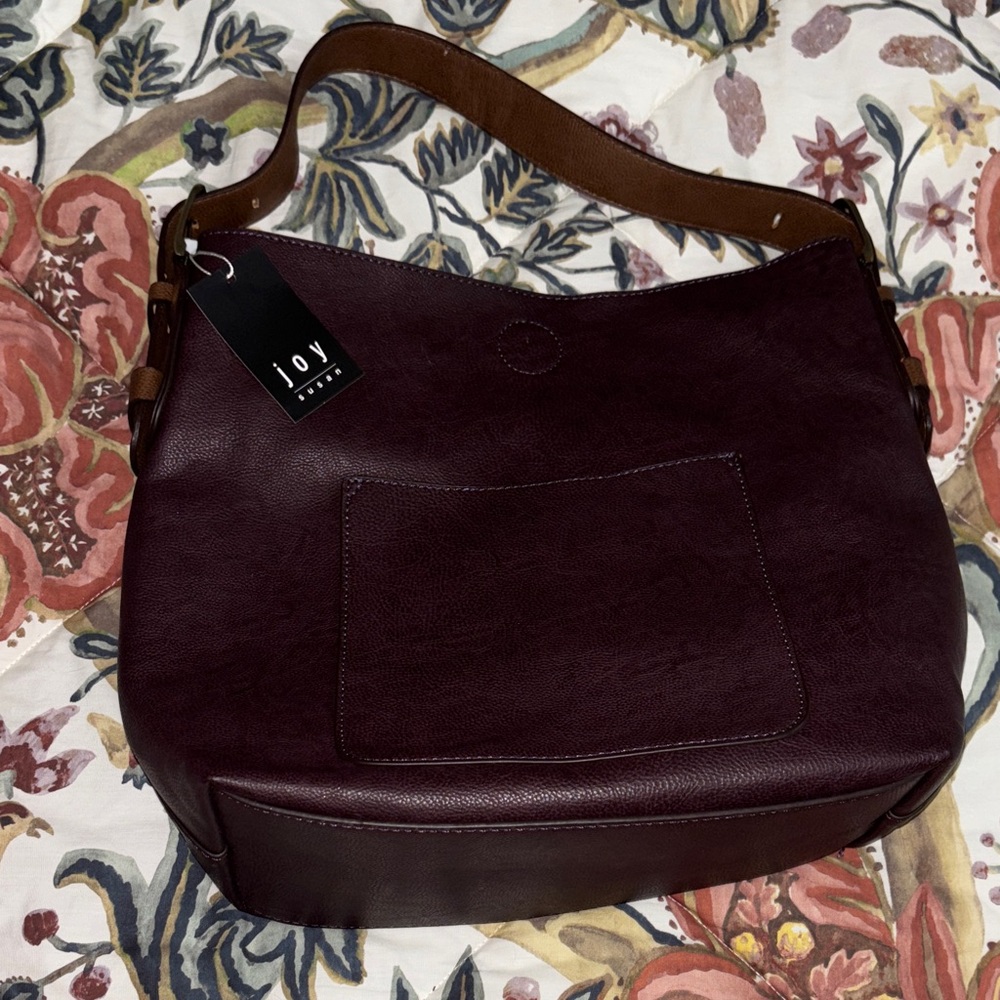 Women's Burgundy Shoulder Bag with matching mini makeup bag.